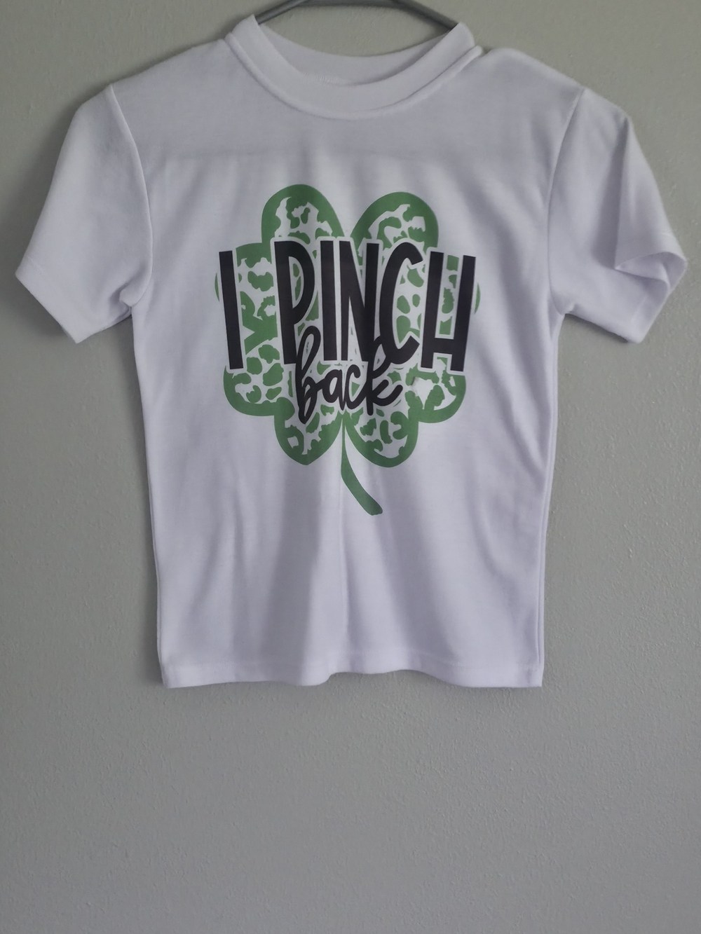 White Kids Short Sleeve Tee with Green Shamrock "I Pinch Back" Graphic